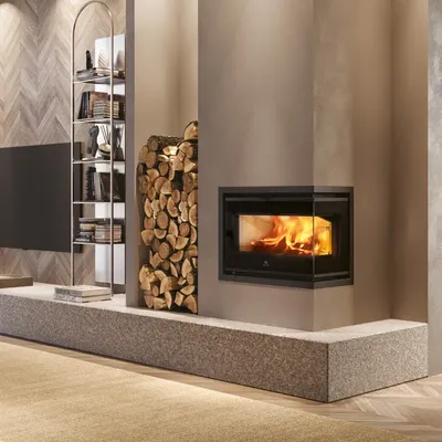 Insert à bois Edilkamin Firebox 49 Evo L/R, installé dans un salon